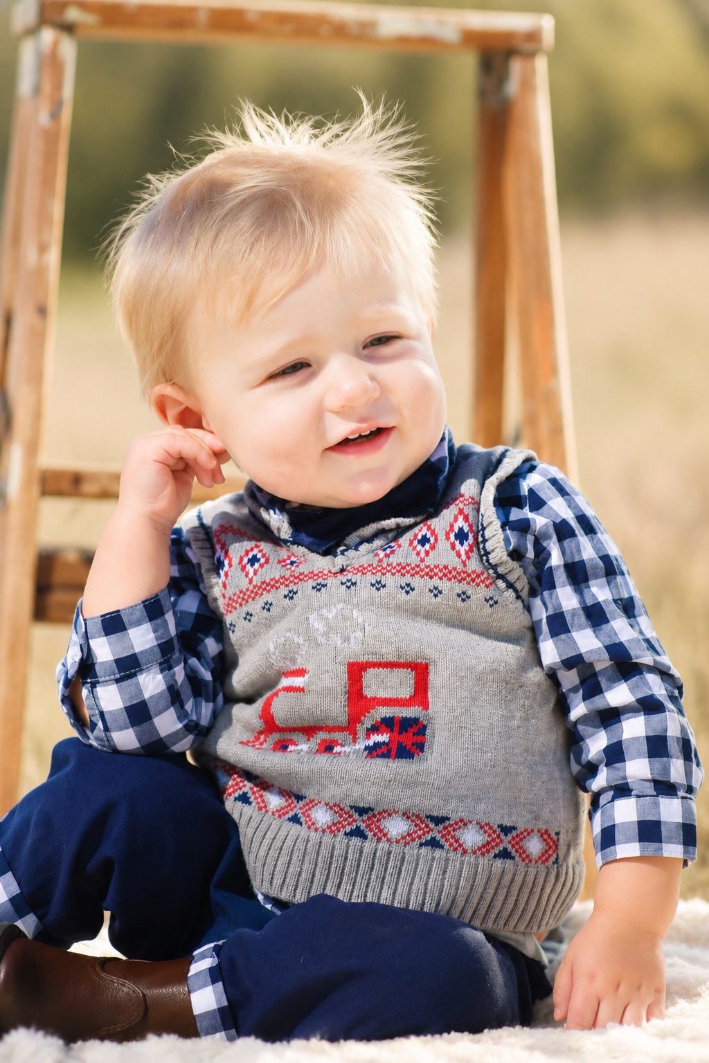 Studio portrait of a baby boy in a knitted sweater