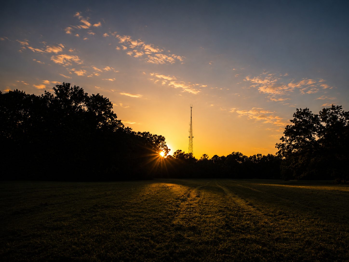 Oklahoma sunset over an open field